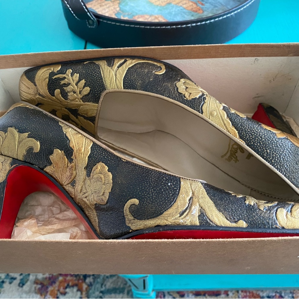 Christian Louboutin Gold and Black High Heels with Intricate Design